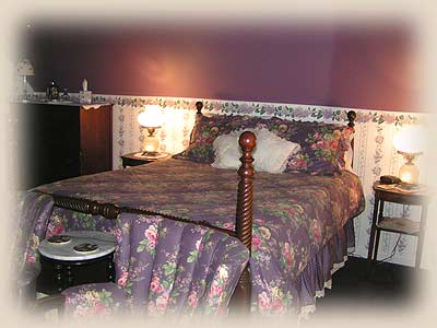 Dogwood room, queen bed with mauve bedding